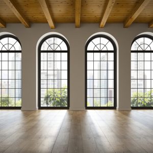 Empty loft room with arc windows 3D rendering